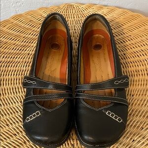 Clarks Black Flats with White Stitching